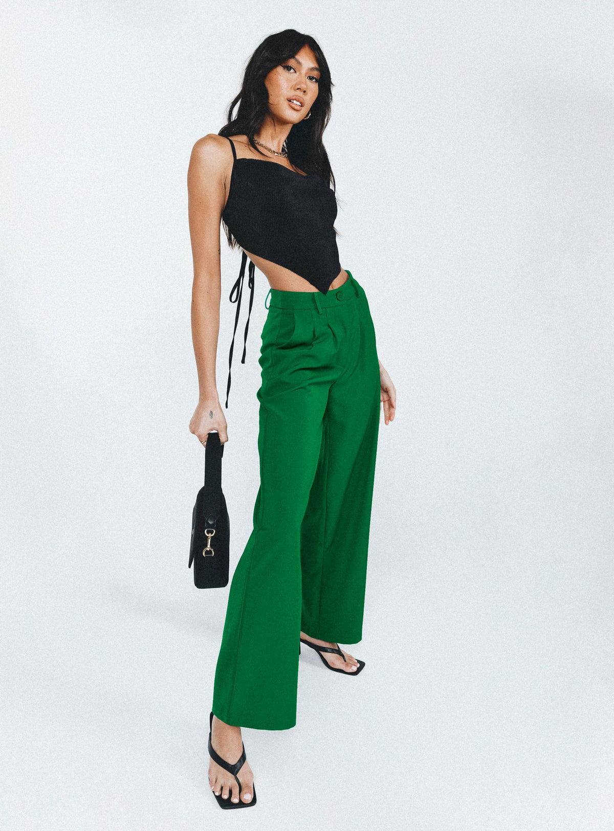 side view of model wearing Princess Polly Archer Pants Apple Green Pants 