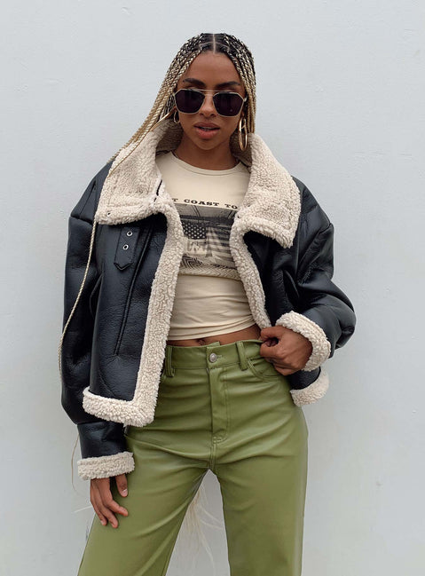 Oversized jacket Faux leather material Faux fur lining  Buckle fastening at neck  Press buttons Zip front  Fully lined 