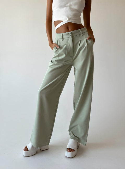back view of model wearing Princess Polly Archer Pants Green Pants 