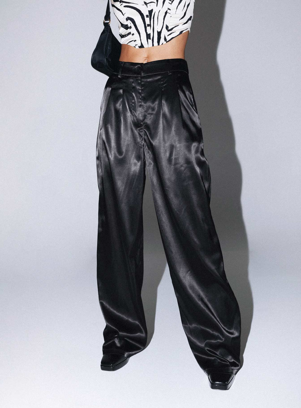 back view of model wearing Princess Polly Archer Pants Satin Black Pants 