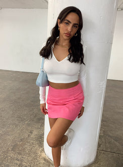   side view of model wearing Princess Polly Selby Mini Skirt Pink Skirts 
