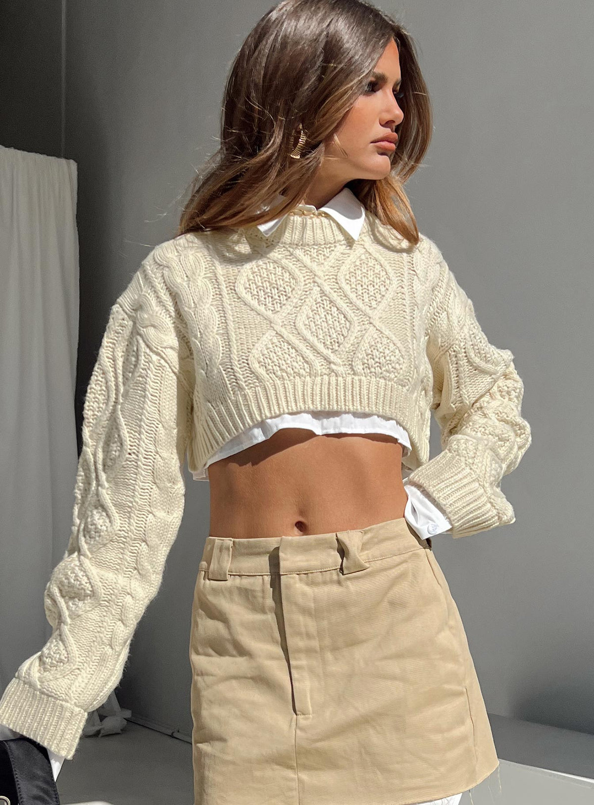 Front view of model wearing  front Sonny Cropped Sweater Cream Princess Polly  Cropped 