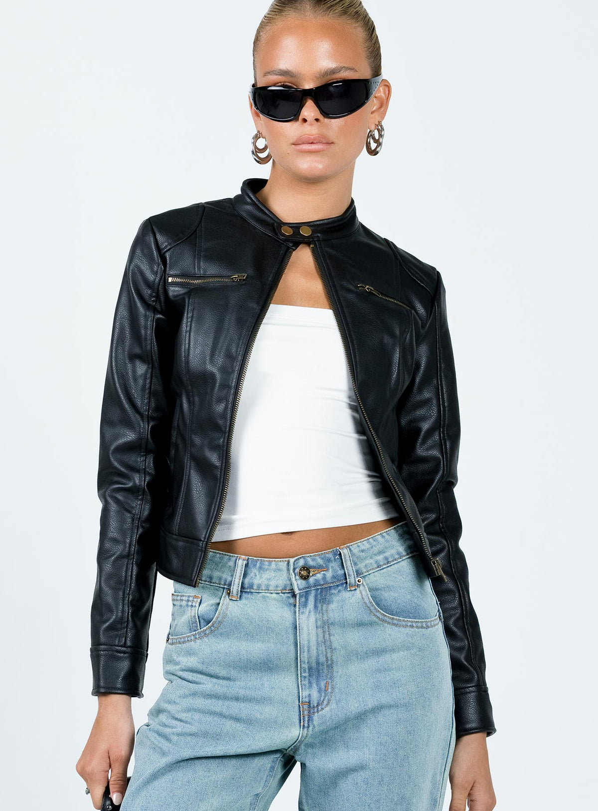 Leather jacket Faux leather material Gold-toned hardware High neck Zip fastening at front
