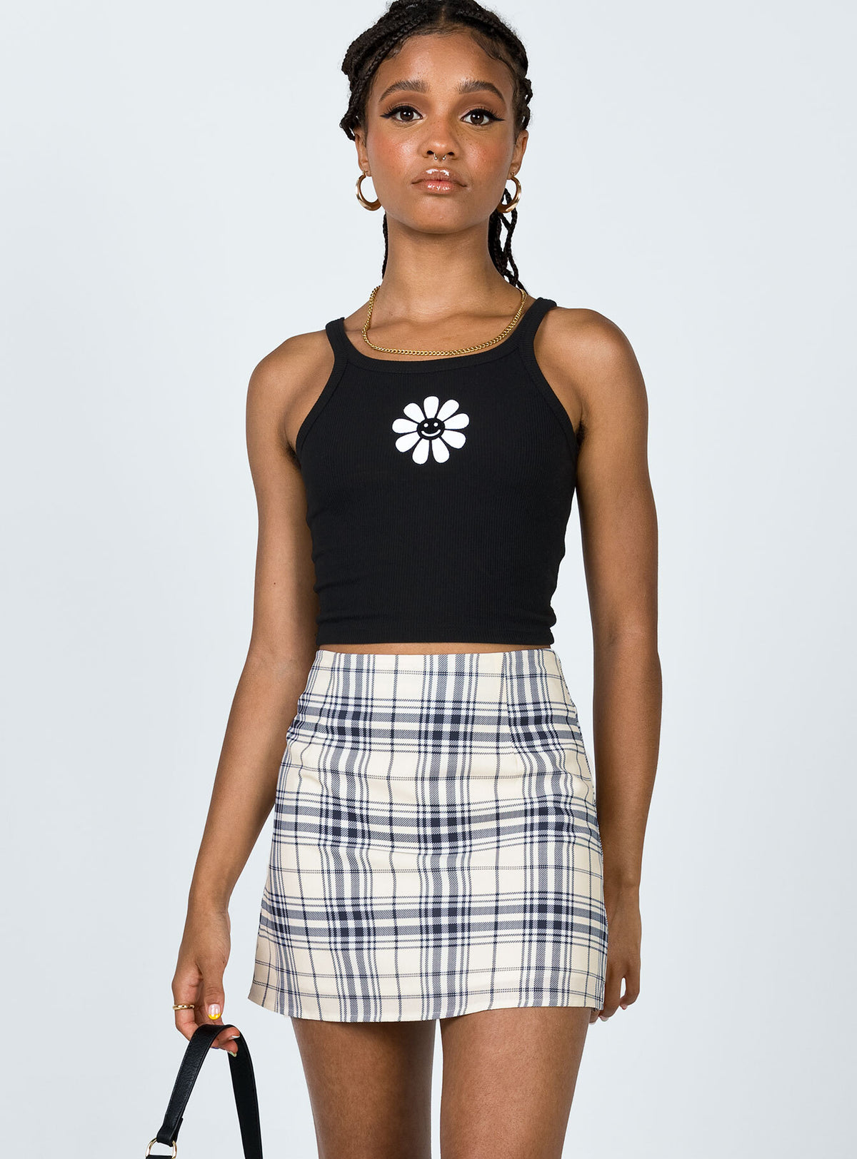   side view of model wearing Princess Polly Selby Mini Skirt Yellow Plaid Skirts 