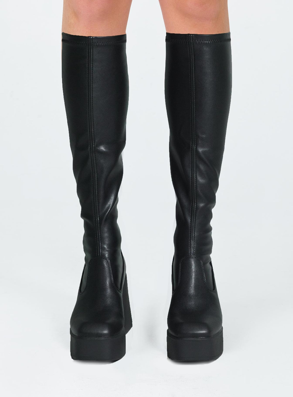 Boots  Faux leather material  Fitted at leg  Block heel Platform base  Square toe  Good stretch 