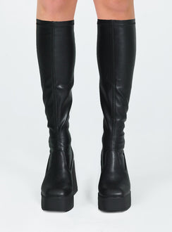 Boots  Faux leather material  Fitted at leg  Block heel Platform base  Square toe  Good stretch 