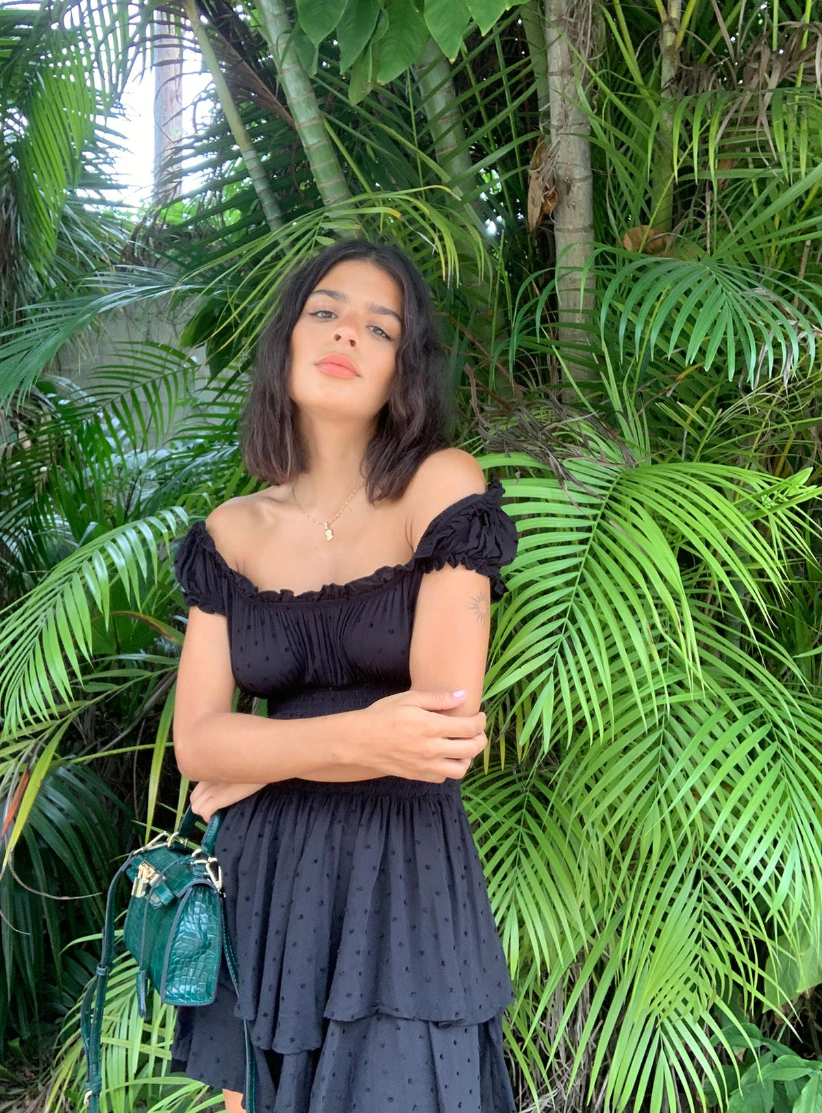 Black romper Can be worn on or off the shoulder Shirred waistband Ruffle detailing Elasticated neck & sleeves