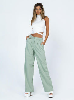 side view of model wearing Princess Polly Archer Pants Green Pants 
