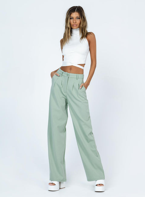 side view of model wearing Princess Polly Archer Pants Green Pants 