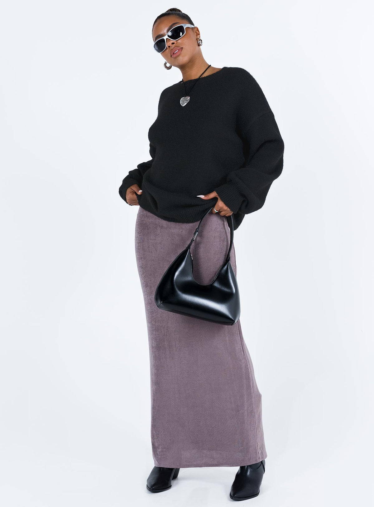 Crafted as the Ryanna Sweater Black womens-jumpers with long length in an oversized silhouette front view of model wearing Princess Polly