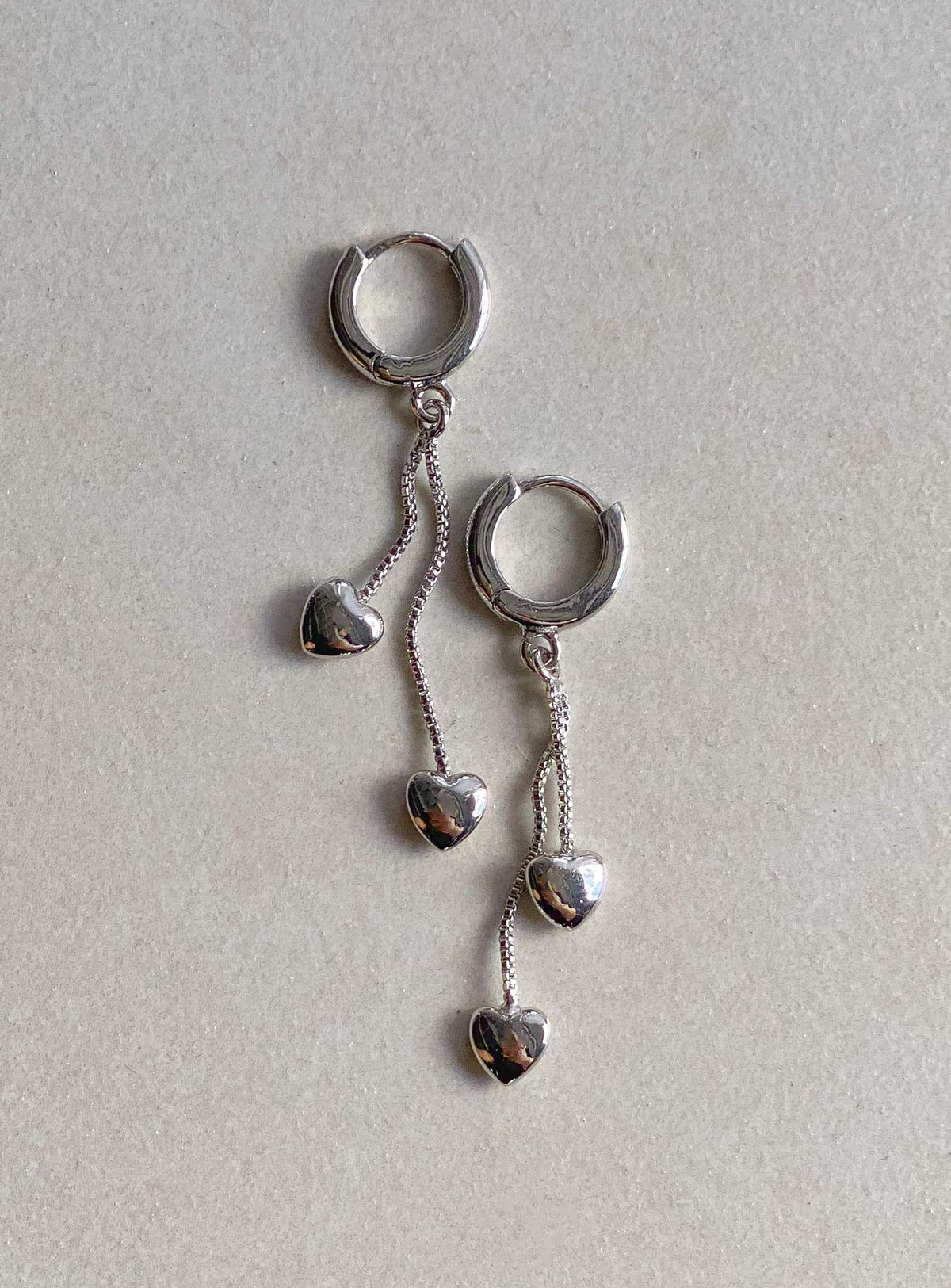 Earrings Huggie hoop style Drop chain Heart charm Gold-toned