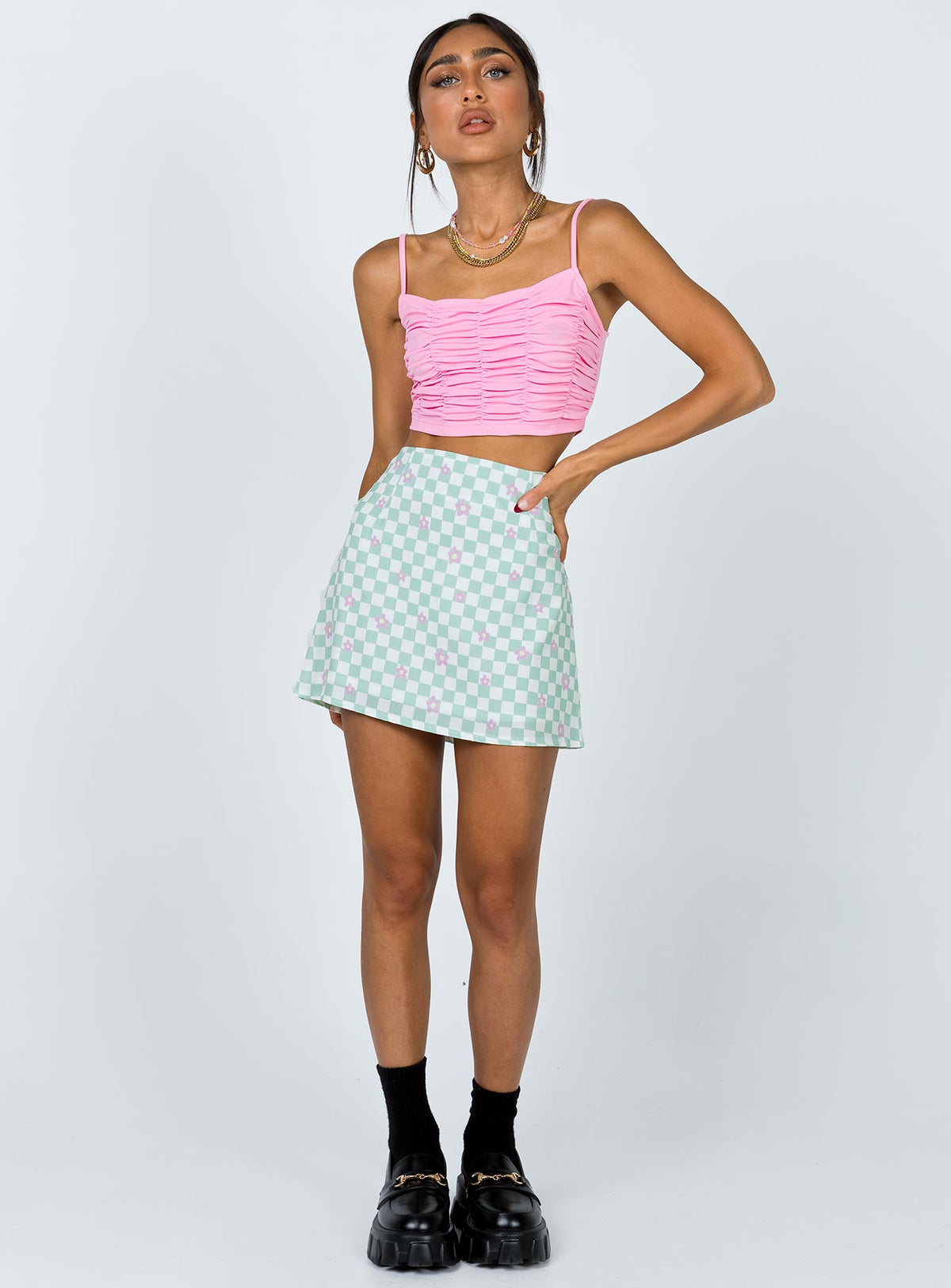   front view of model wearing Princess Polly Selby Mini Skirt Green Floral Check Skirts 
