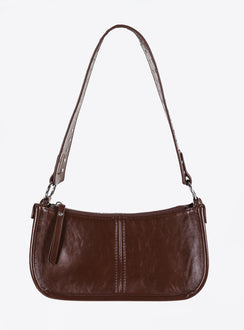 Dark brown bag Faux leather material Zip fastening Adjustable & removable cross-body strap Removable fixed shoulder strap Internal pocket Silver toned hardware Flat base