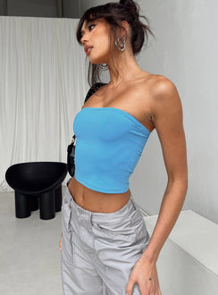 side view of model wearing Princess Polly Tomlin Top Blue Sleeveless 
