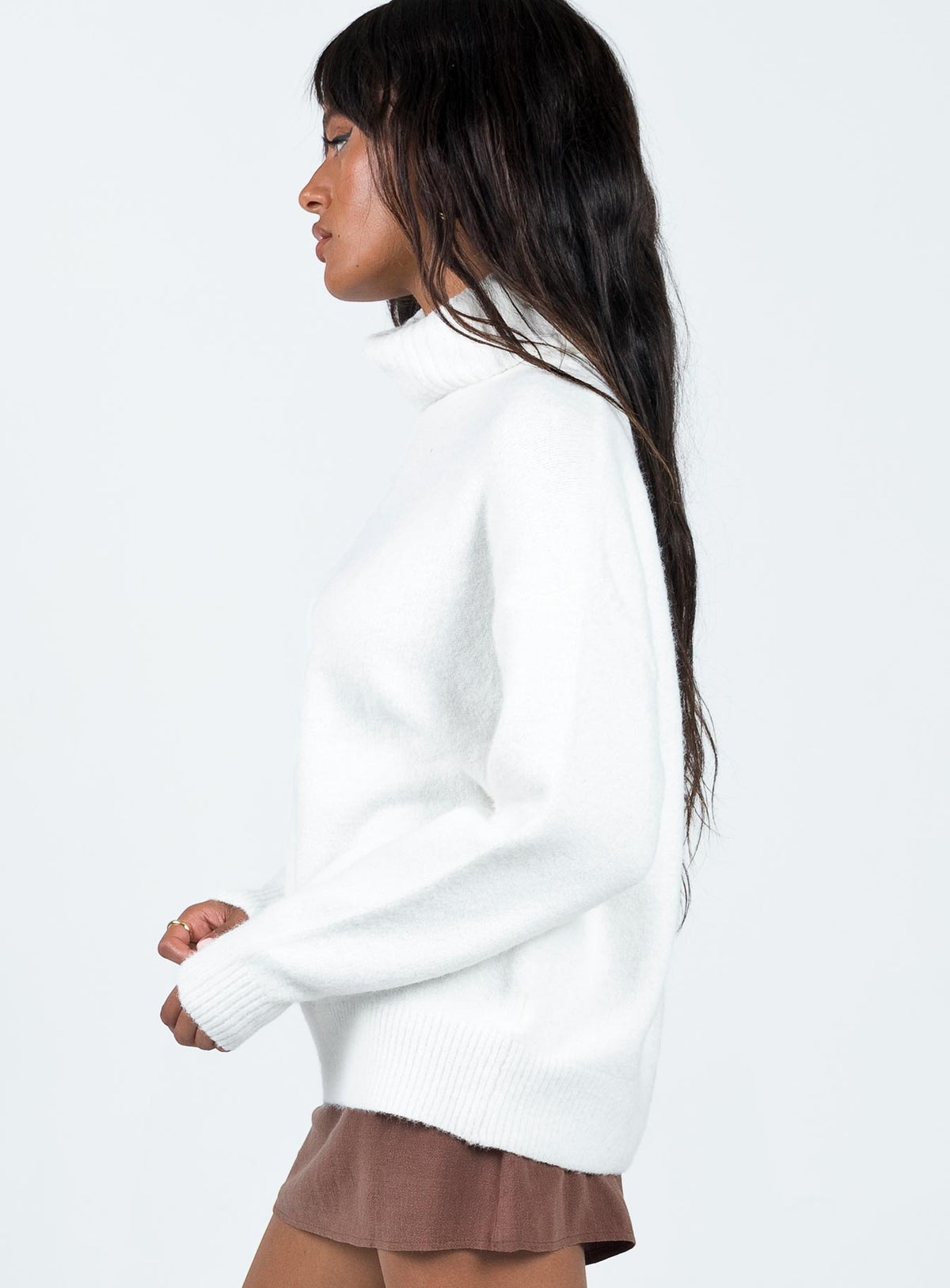 side view of model wearing Princess Polly Oswin Turtleneck Sweater White Longline Jumpers Jumpers 