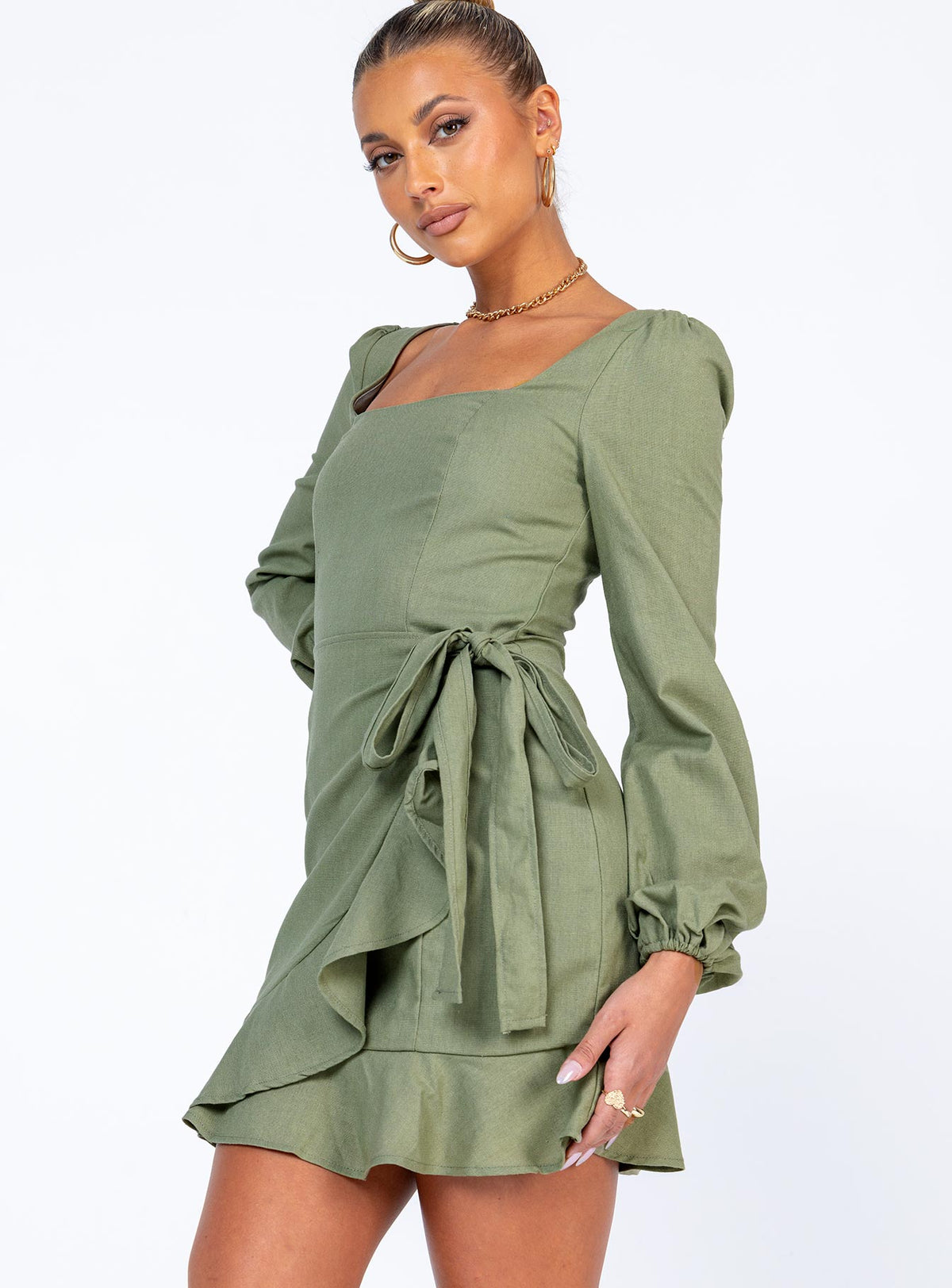 side view of model wearing Princess Polly The Villa Mini Dress Green 