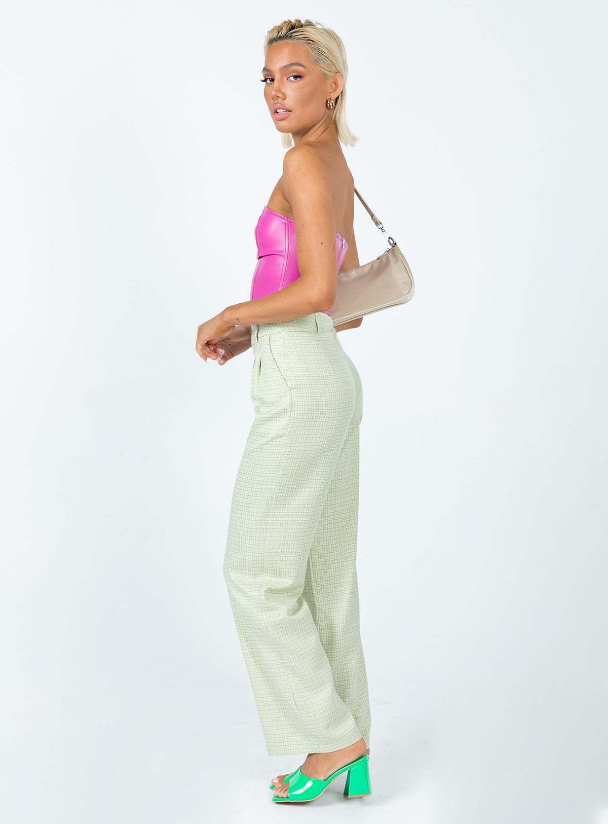side view of model wearing Princess Polly Archer Pants Green Check Pants 