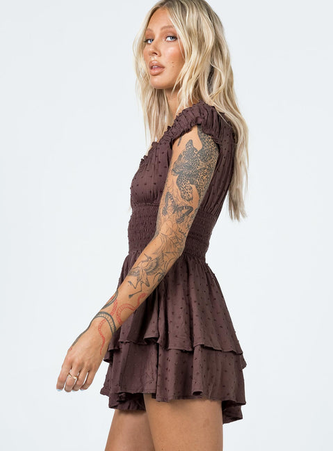 Romper Soft textured material Shirred waistband Ruffle detailing Elasticated neck and sleeves Can be worn on or off shoulder Layered ruffle hem Fully lined