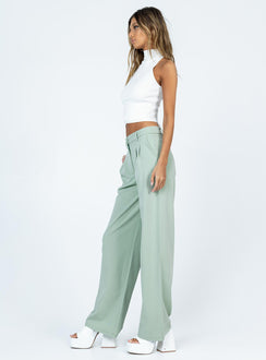 side view of model wearing Princess Polly Archer Pants Green Pants 