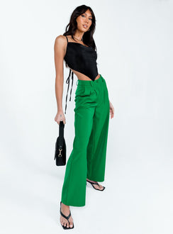 front view of model wearing Princess Polly Archer Pants Apple Green Pants 
