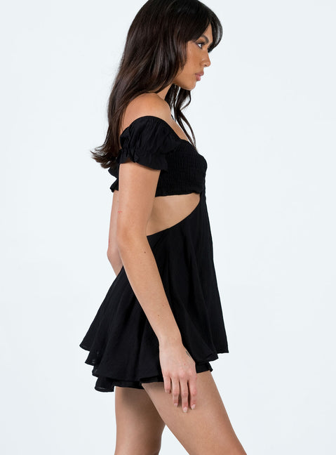 Romper Elasticated shoulders and neckline Shirred bust Can be worn on or off shoulder Cut out sides and back Layered ruffle hem Good stretch Lined 
