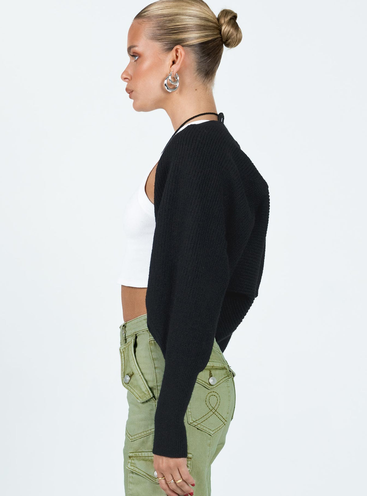 side view of model wearing Princess Polly Aviana Cardigan Black cropped Jumpers 