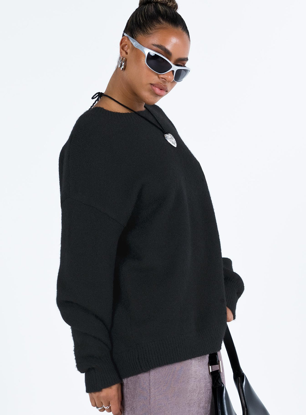 Designed with the Ryanna Sweater Black womens-jumpers featuring long top length and oversized cut side view of model wearing Princess Polly