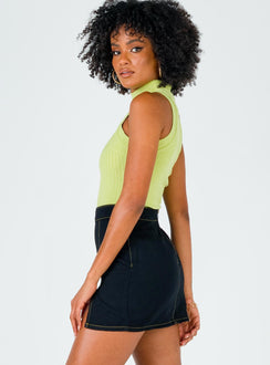  side view of model wearing Princess Polly The Lola Mini Skirt Contrast Stitching Black Skirts 