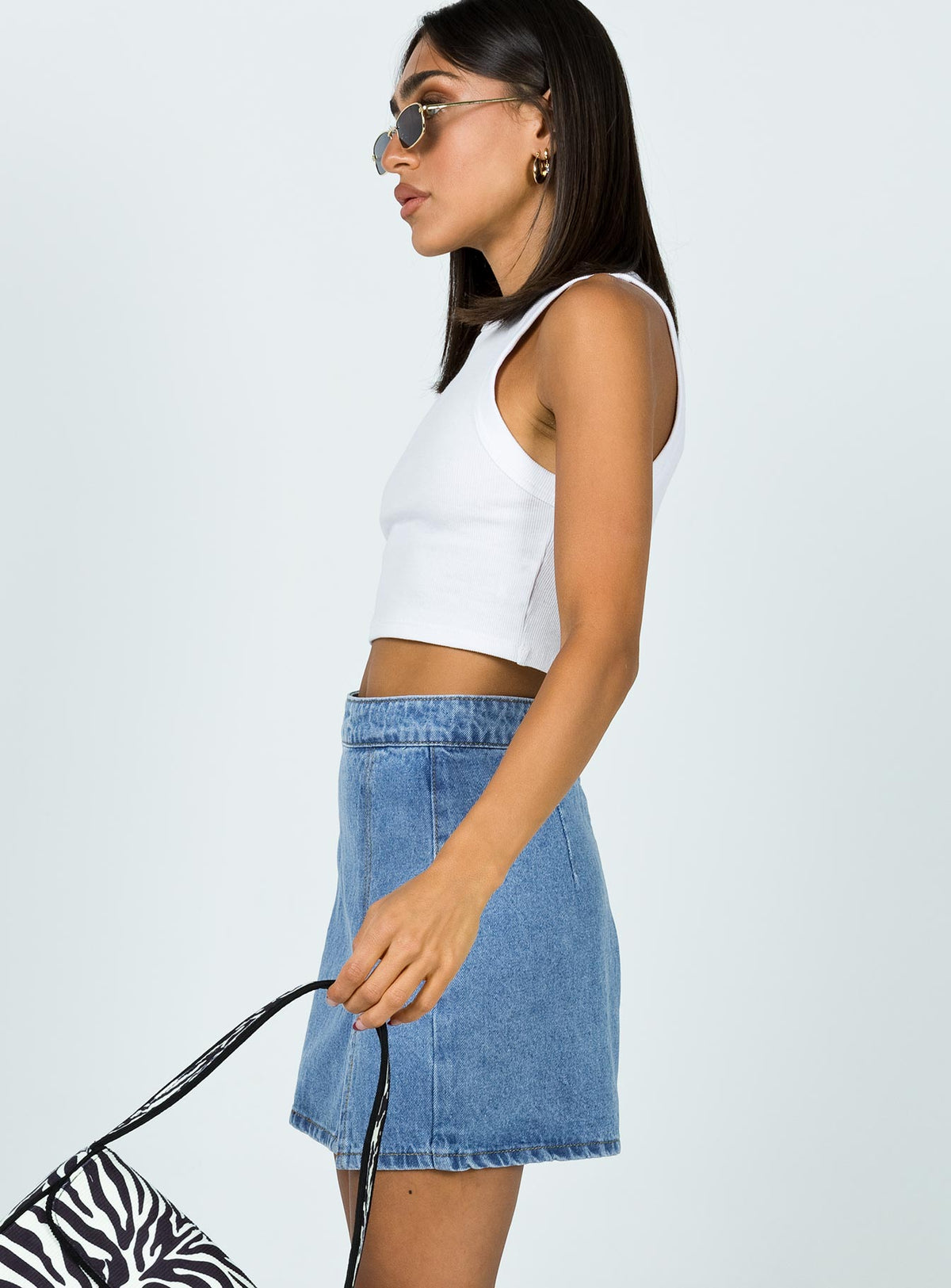   side view of model wearing Princess Polly The Lola Mini Skirt Denim Skirts 