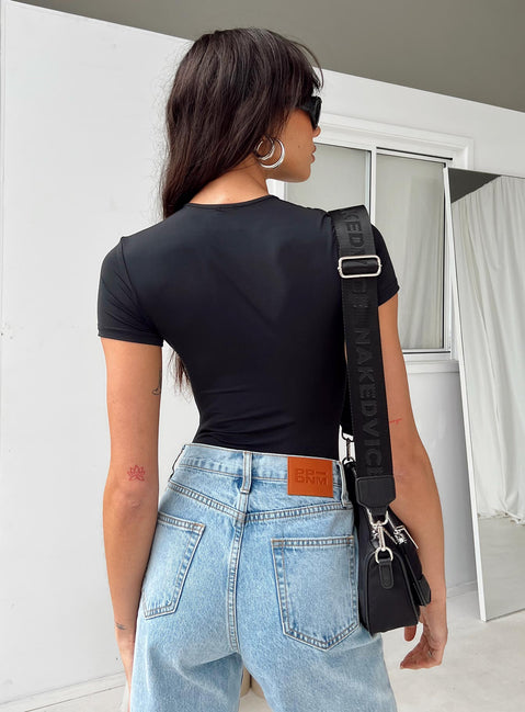 back view of model wearing Princess Polly Rover Bodysuit Black Short Sleeve Bodysuit 
