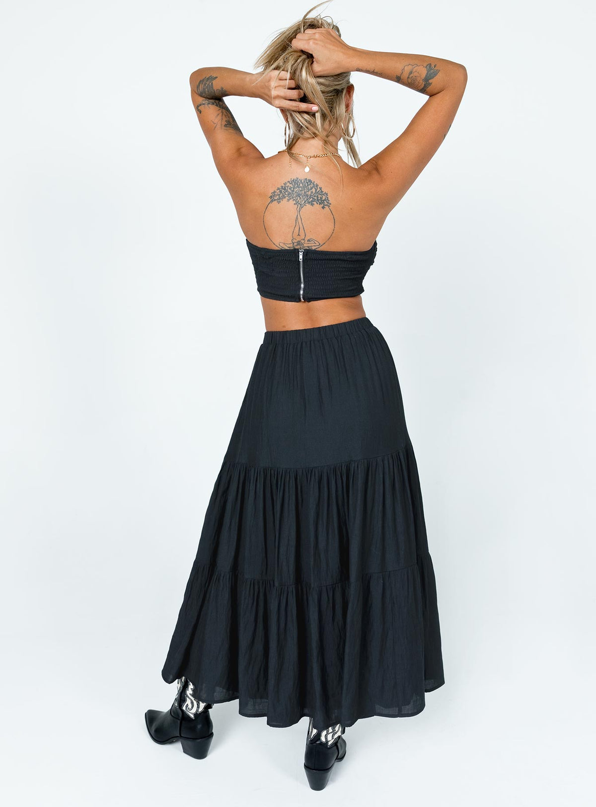 Black matching set Crop top Removable shoulder straps  Inner silicone strip at bust  Twisted bust  Cut out detail  Shirred back  Zip fastening  High waisted midi skirt  Elasticated waistband  Layered design 