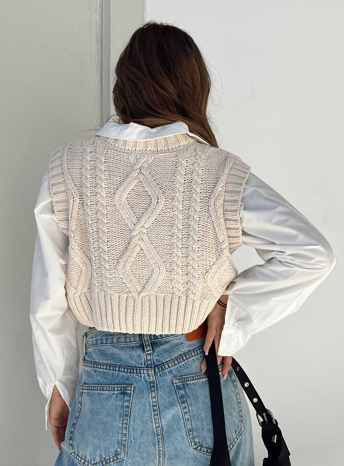 back view of model wearing Princess Polly Carey Sweater Vest Beige Cropped Jumpers Jumpers 