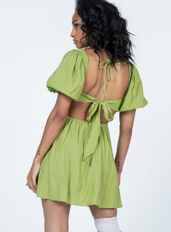 back view of model wearing Princess Polly Dani Mini Dress Green Square Neck 