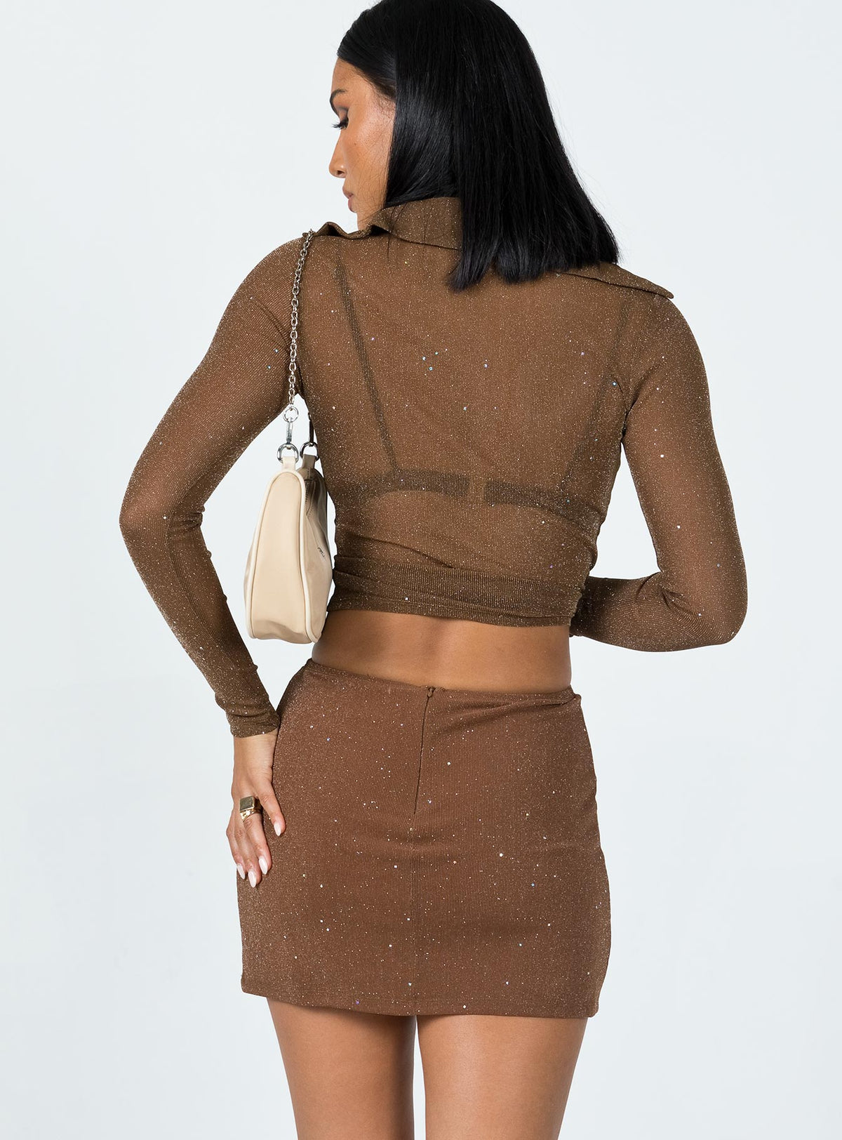 back view of model wearing Princess Polly Selby Mini Skirt Brown Glitter Skirts 