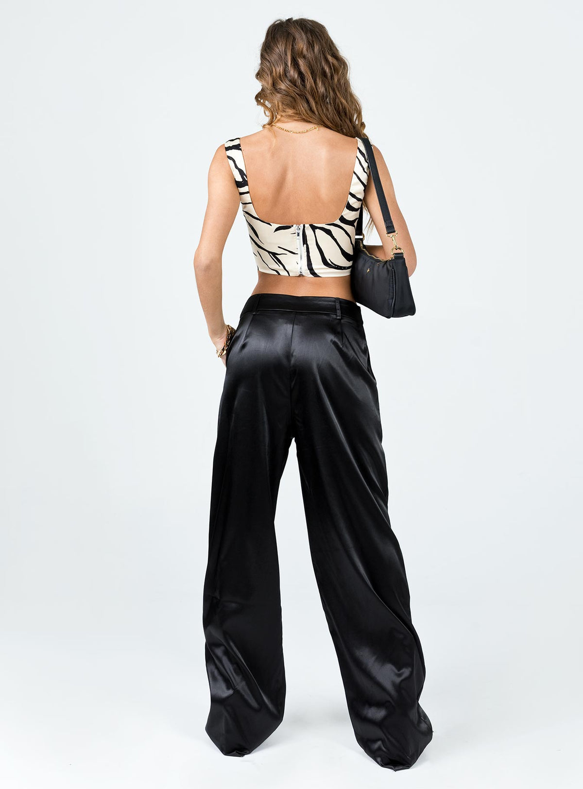 back view of model wearing Princess Polly Archer Pants Satin Black Pants 