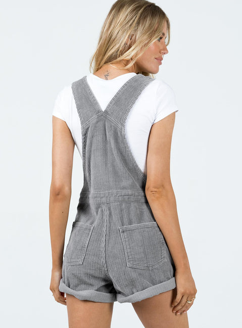 Overalls Corduroy material Adjustable buckle straps Button fastening at sides Large chest pocket Classic four pockets  Gold-toned hardware  Fixed rolled hem