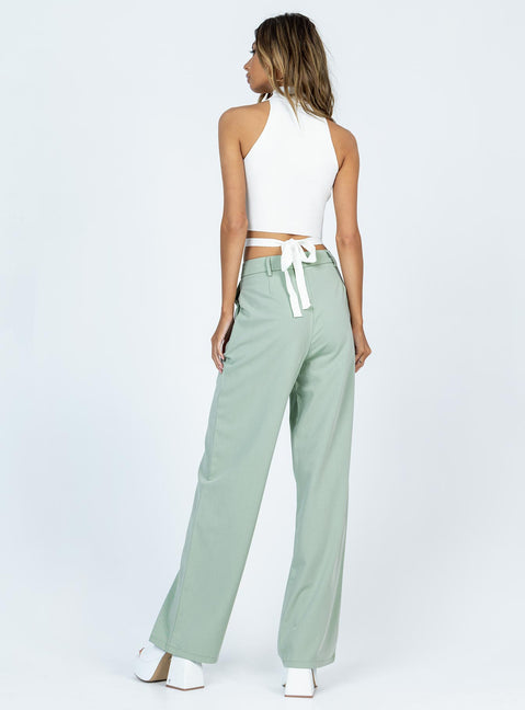 back view of model wearing Princess Polly Archer Pants Green Pants 