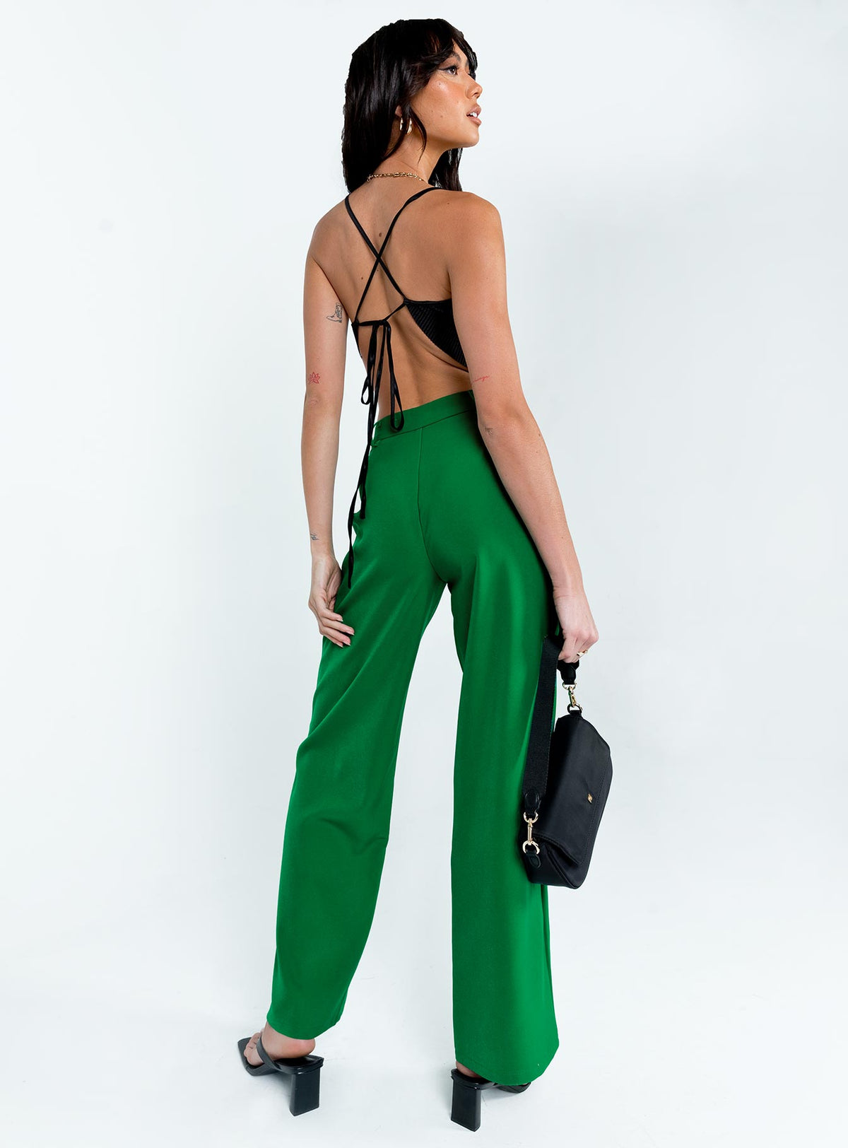 back view of model wearing Princess Polly Archer Pants Apple Green Pants 