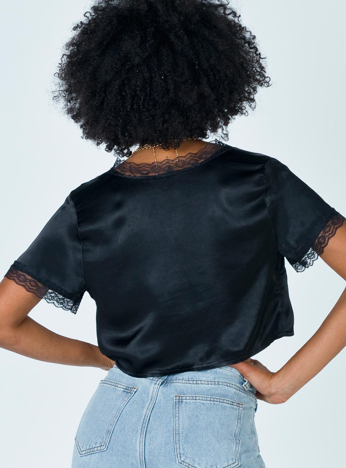 back view of model wearing Princess Polly Vintage Tie Up Top Black 
