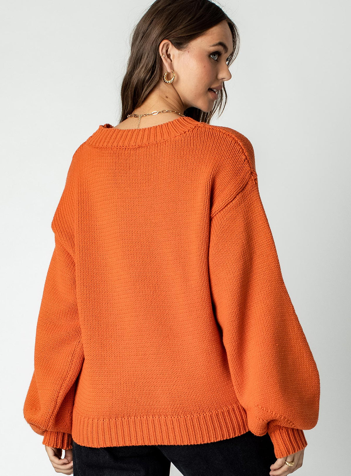 back view of model wearing Princess Polly Harmony Oversized Sweater Orange Jumpers 