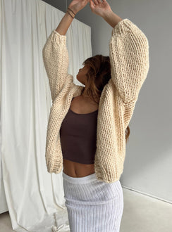 side view of model wearing Princess Polly Lester Knit Cardigan Cream Longline Jumpers Jumpers 