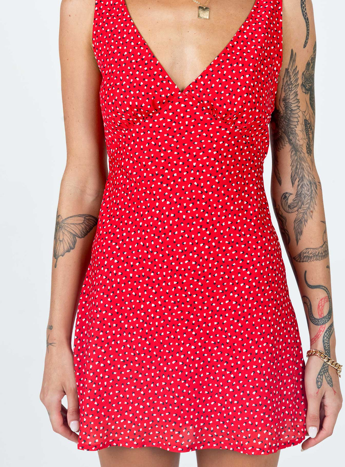 back view of model wearing Princess Polly Nellie Mini Dress Red Floral V-Neck 