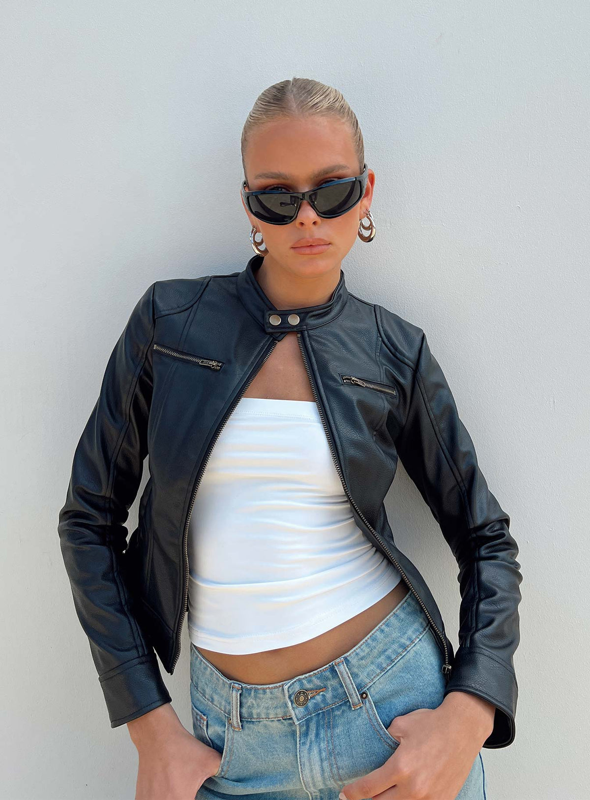 Leather jacket Faux leather material Gold-toned hardware High neck Zip fastening at front