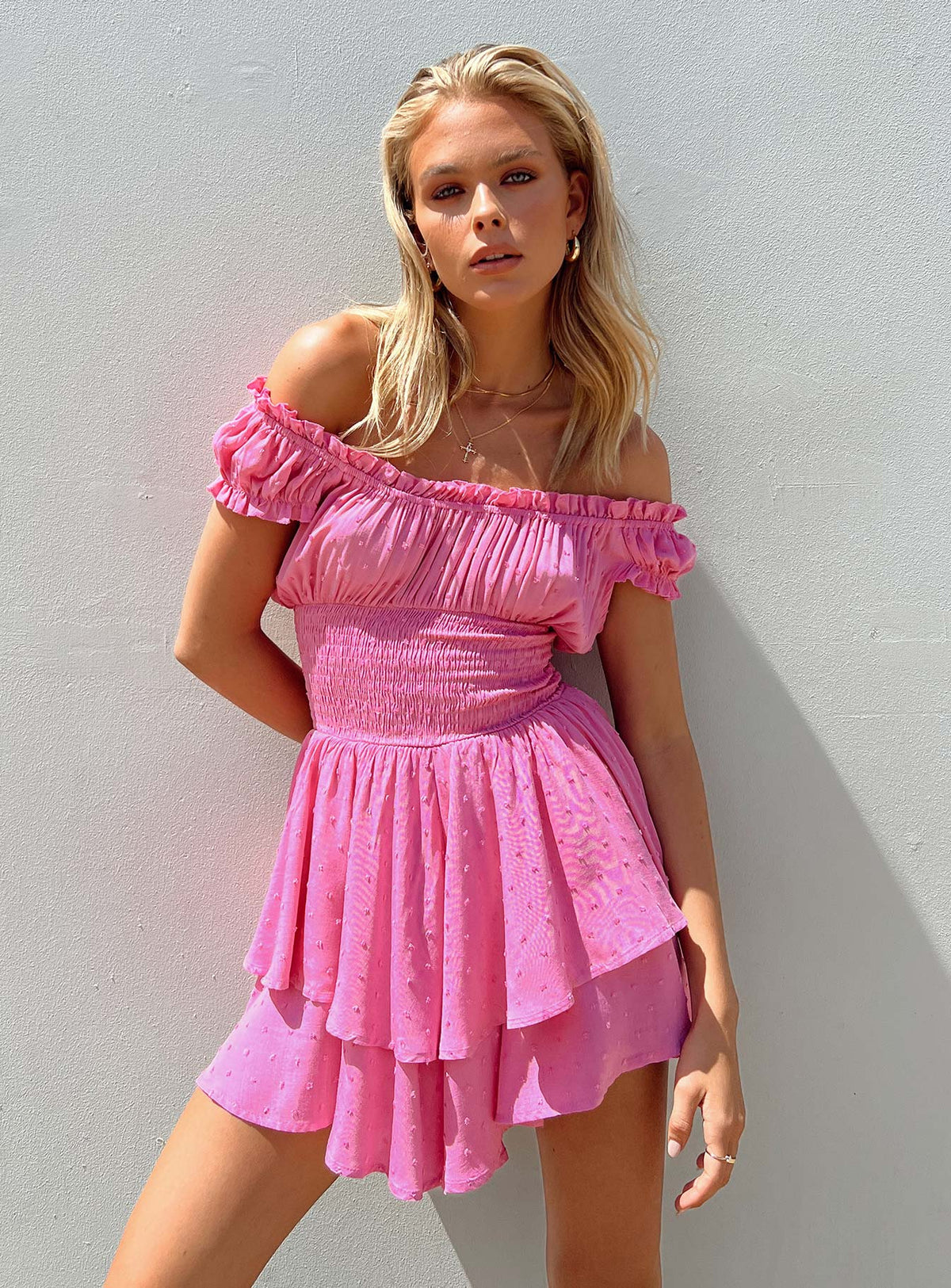 Romper Shirred waistband Ruffle detailing Elasticated neck & sleeves Can be worn on or off-shoulder