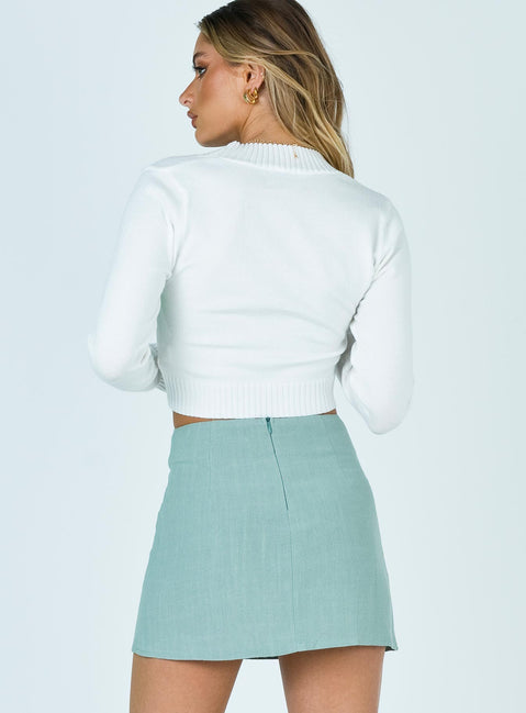 back view of model wearing Princess Polly Selby Mini Skirt Green Skirts 