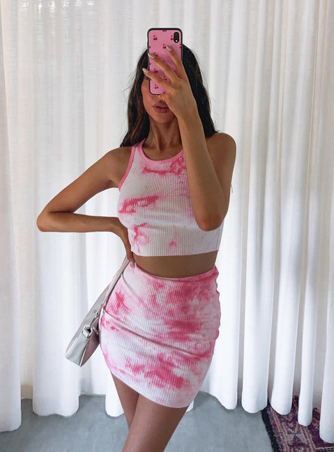 Showcasing the Kiele Tie Dye Mini Skirt Pink in womens-skirts with fitted mini length front view of model wearing Princess Polly