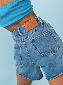 back view of model wearing Princess Polly Tropicana Shorts Denim High Waisted Shorts 