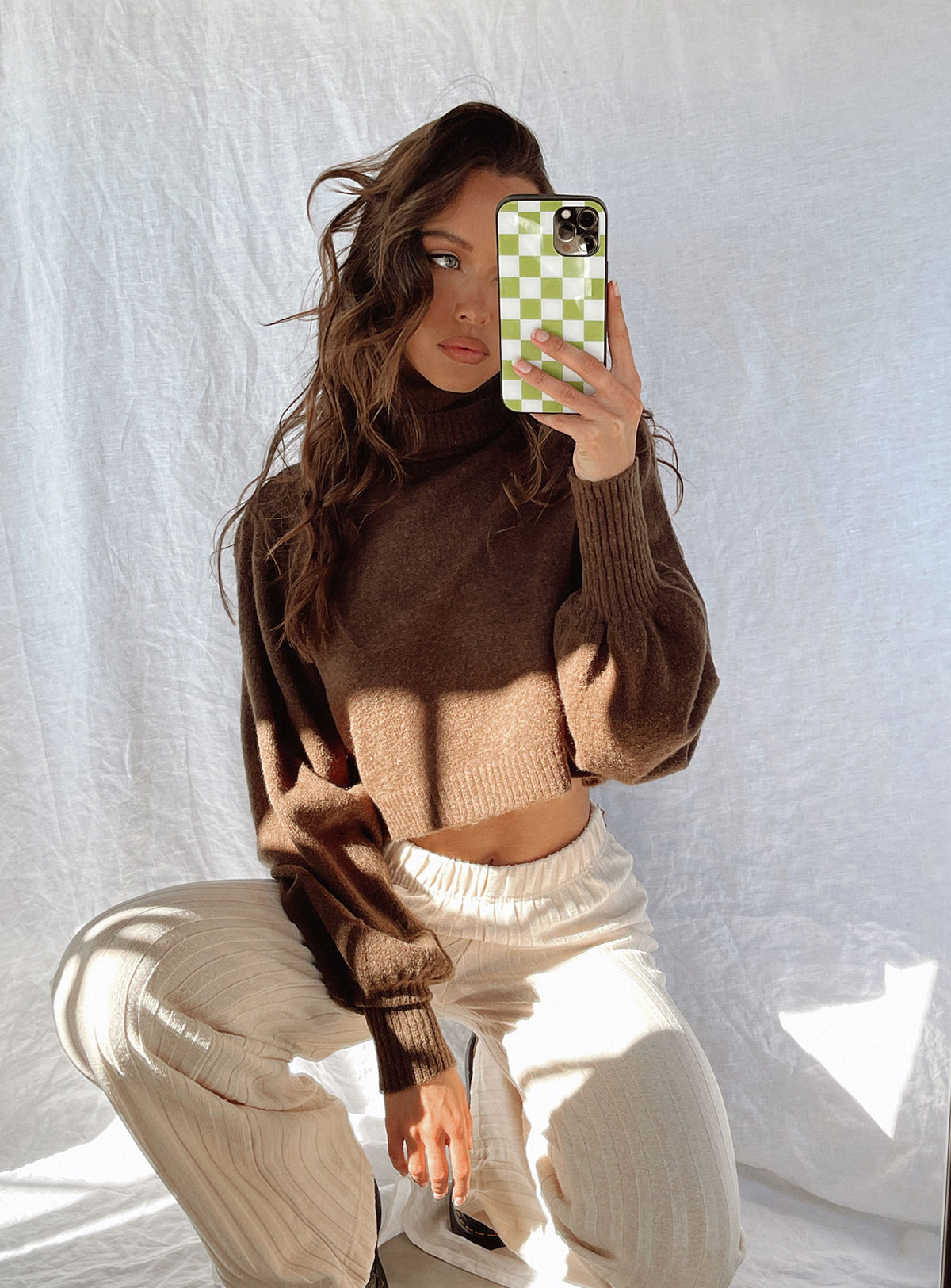 side view of model wearing Princess Polly Zahara Cropped Turtleneck Sweater Brown Cropped Jumpers Jumpers 